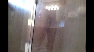 A guy washed his body in the shower, not knowing he was being filmed