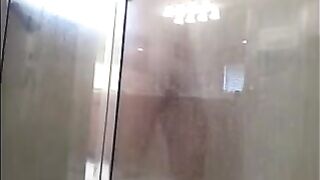 A guy washed his body in the shower, not knowing he was being filmed