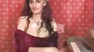 A hot girl with natural big tits plays with her hairy pussy using fingers