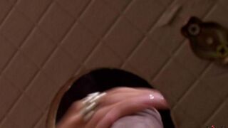 A beauty got a dick in her mouth through a hole in the toilet bowl