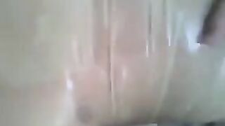 Guy put a condom on his dick and masturbated with his hand