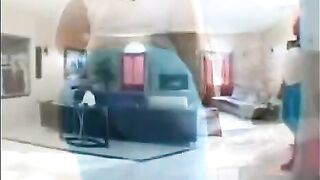 A fat black woman is having sex on the couch