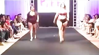 Fatty bitches run on the boardwalk in front of the camera