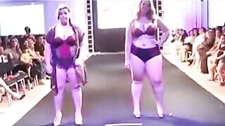 Fatty bitches run on the boardwalk in front of the camera