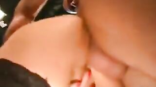 A German hooker is getting fucked and her dick sucked by a group