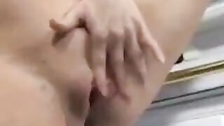 A man came to the kitchen and saw a pregnant woman, who made him cum