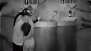 Porn from the past with a group of three people engaging in passionate acts