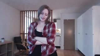 The cutie caresses her wet pussy while her partner watches