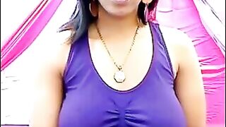 Her nipples are standing when her shirt is too small to hold them