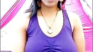 Her nipples are standing when her shirt is too small to hold them