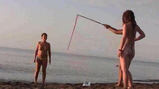 Girl shows her body on the naked beach