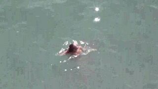 A couple has fun on the deck without any clothes