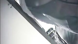The hidden camera at the checkout captures skirt views