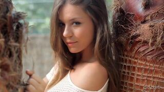 Hot young Russian babe takes off her clothes and dances sexy striptease