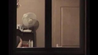 The guy admires himself in the mirror, completely naked, big dick