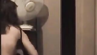 The guy admires himself in the mirror, completely naked, big dick