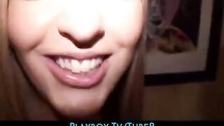 A young student is having fun with her girlfriend at a party