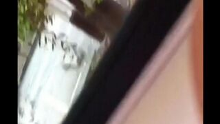 A guy masturbates his dick on the street and comes in his pants