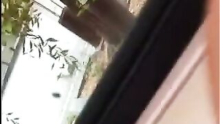 A guy masturbates his dick on the street and comes in his pants