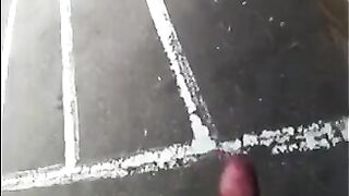 A guy masturbates his dick on the street and comes in his pants