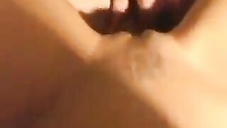 A close-up shot shows a thin woman with an amazing body, captured in intimate detail