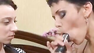 A mother taught her daughter to make a blowjob using a strapon