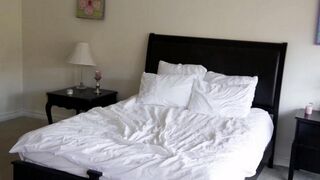 Two blondes have gentle sex on the bed, showcasing their delicate passion