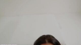 A girl with beautiful breasts gets a cumshot on her face and tits
