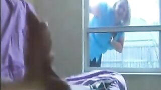 A woman peeps for a man sitting in the ward and jerking off a member