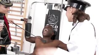 Two girls share a big black cock in a hot threesome scene