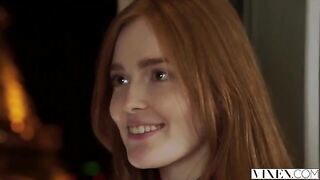 The guy carefully licked the gingerbread of the red-haired girl