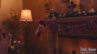 A hot blondie is giving a passionate Christmas footjob with long nails