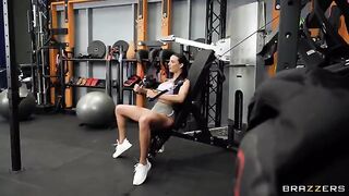 The girl is having fun with her friend in the gym, getting sweaty