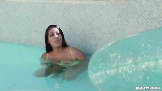 The lesson of swimming for a cute girl in a bikini