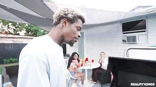 A guy with big black cock fucks brunette chick at the barbecue party