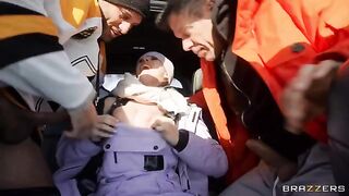 A snow angel is getting fucked by two guys in the car