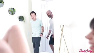 A girl is having fun with two guys at a swingers party