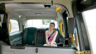 The girl stuck her tongue out and groaned in the car
