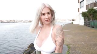 A hot blonde tries to seduce a stranger on her vacation