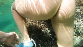 Underwater sex with anal creampie in the water