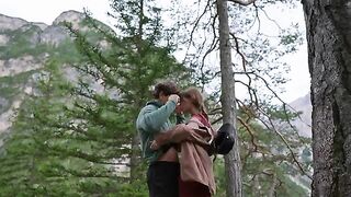 A couple making love outdoors, overwhelmed by the scent of nature