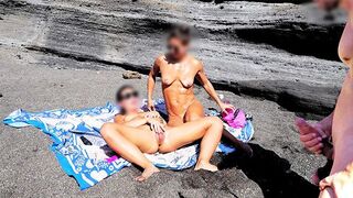 A girl removed her swimsuit and caressed herself on the naked beach