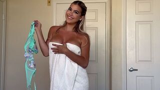 The girl removed her clothes as if peeling a candy wrapper