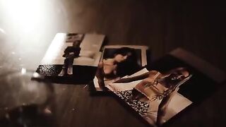 Hot brunette and blonde in a dark threesome scene, showcasing intense passion